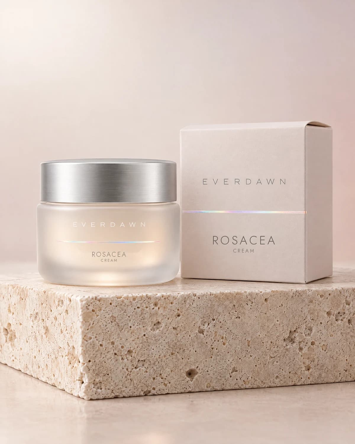 Illustrative packaging: a rosacea cream jar beside its carton on a travertine plinth against a soft studio background. Your medicine is labeled and dispensed by the licensed pharmacy.